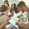 lifestyle image of a group of people reading together outside