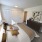 bedroom with spacious areas and easy access to a hallway